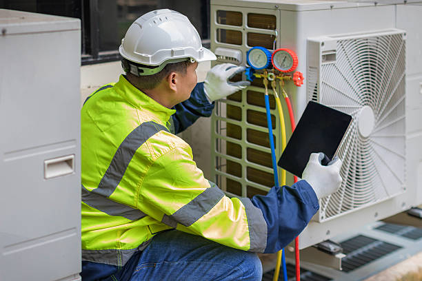 Professional Hvac technician working in George West, TX
